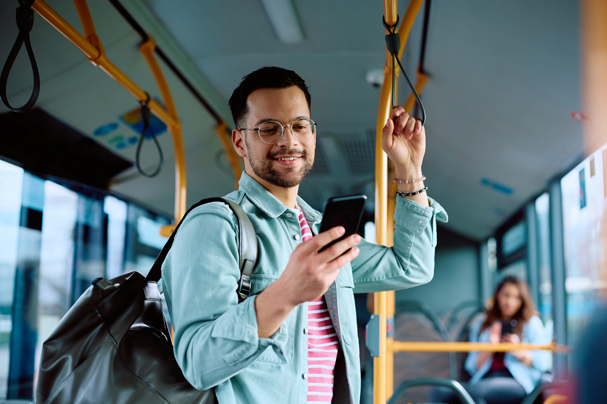 Man On Bus W Phone