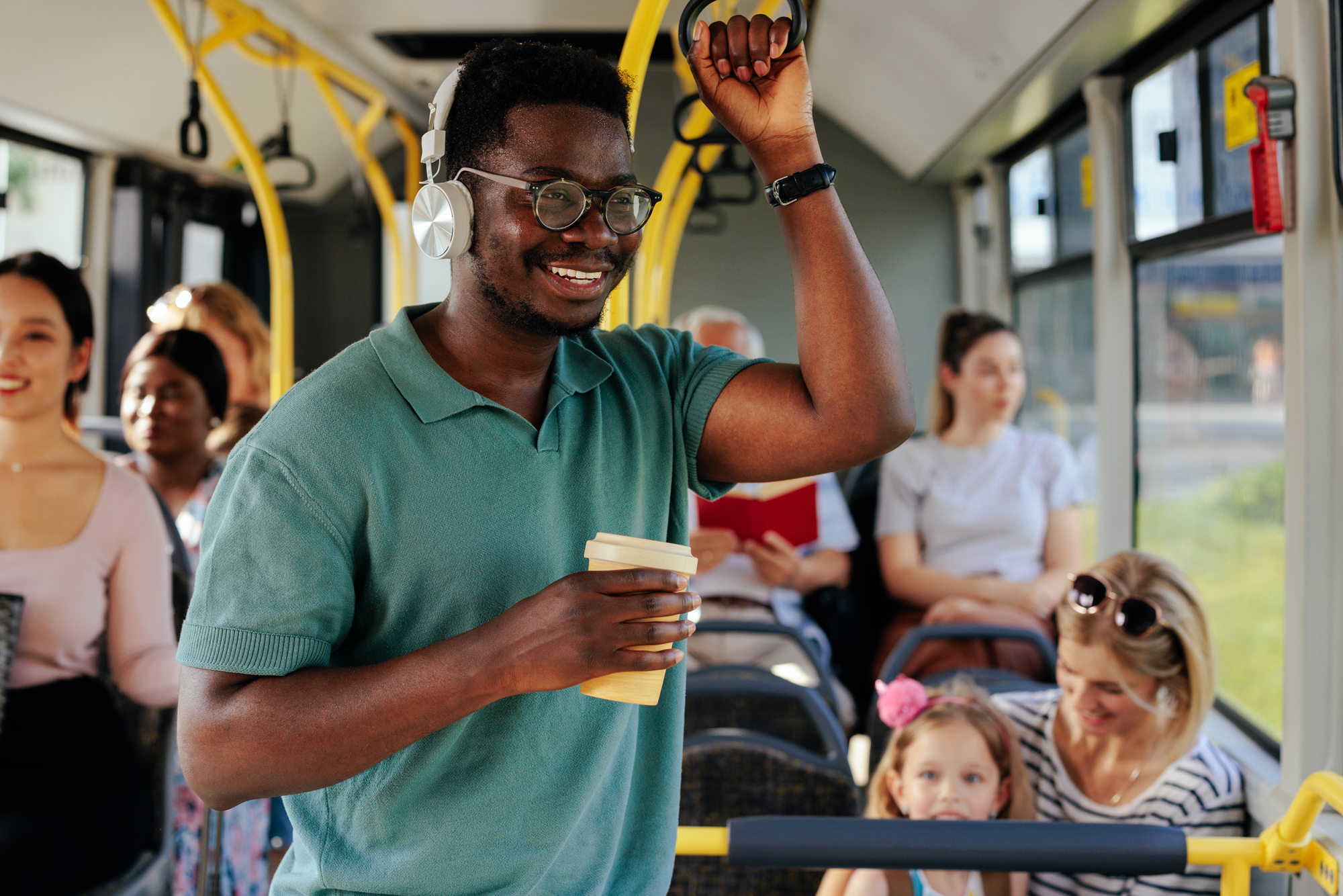 Happy Man Riding Bus
