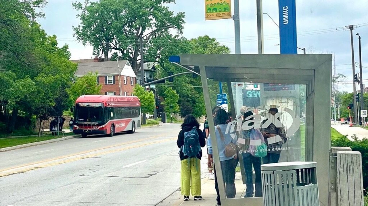 Bus stop with people waiting